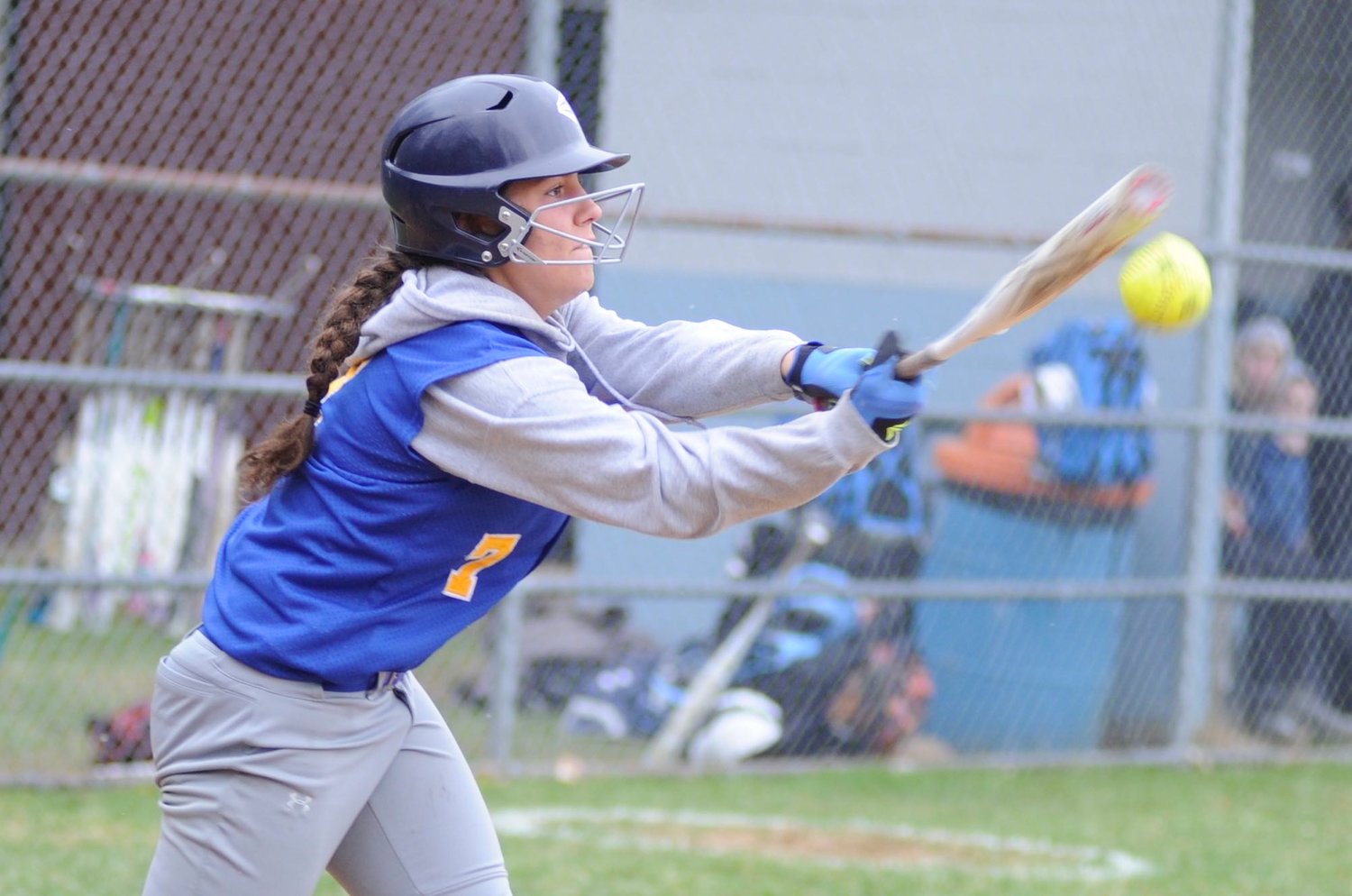Chapel Field’s Heather Schoch connects on a Riley Ernst pitch.